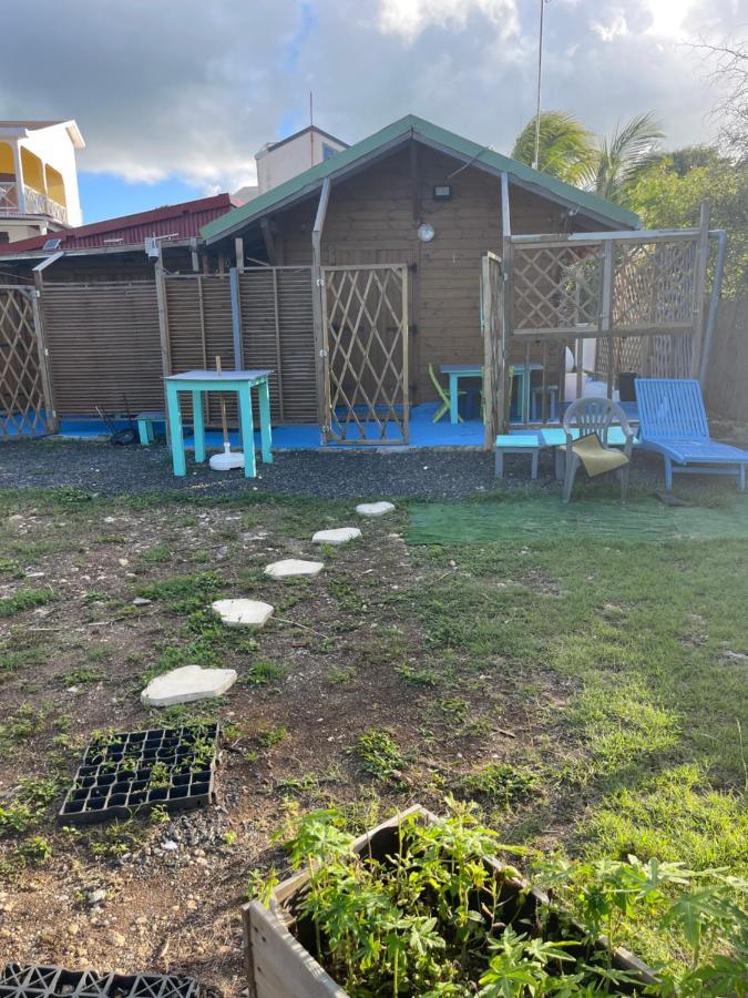 Duo d’appartement séparé par un couloir situé au bord de la mer Le Moule Exterior foto